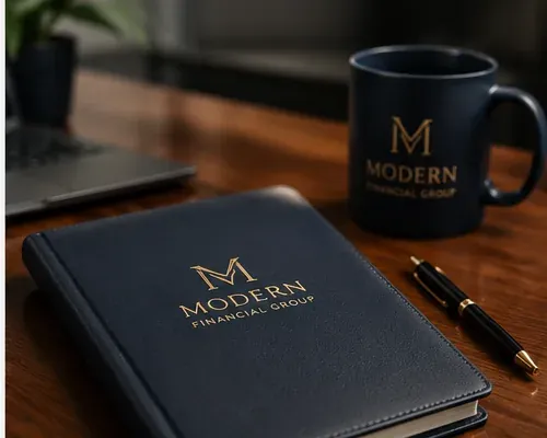 Modern Financial Group portfolio and coffee mug on a desk